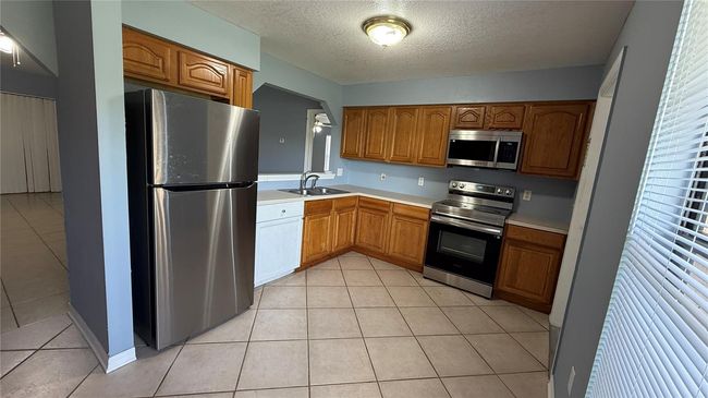 404 Spike Ct, House other with 3 bedrooms, 2 bathrooms and null parking in POINCIANA FL | Image 6
