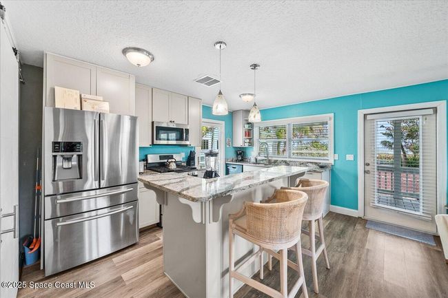 111 S Atlantic Ave, Home with 5 bedrooms, 4 bathrooms and null parking in COCOA BEACH FL | Image 42