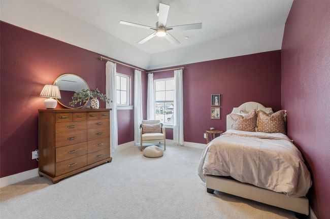3rd bedroom upstairs with adorable corner set of windows. | Image 27