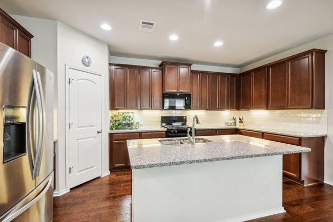 7909 Sunrise Ravine Pass, House other with 4 bedrooms, 3 bathrooms and 4 parking in Lago Vista TX | Image 11