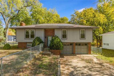 Split foyer home with solar panels and a garage | Image 2