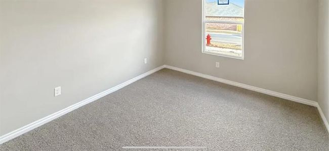 Spare room with carpet and baseboards | Image 21