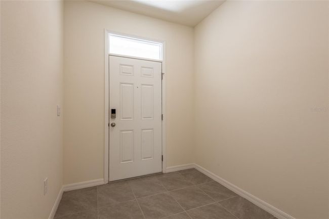 Large foyer with space for sofa table or storage cabinets | Image 9