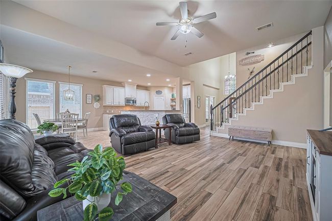 Bright and inviting, the living room’s generous layout makes it ideal for hosting memorable events or enjoying calm, cozy moments at home. | Image 20