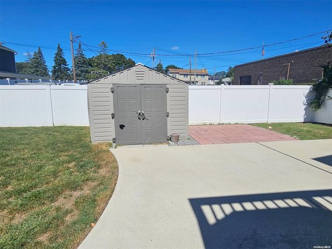 Rear Concrete Patio with shed | Image 23