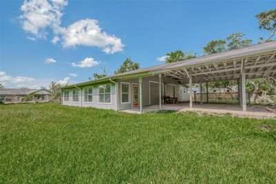 MLS #44235458 Enter the home through the sunporch (red door). | Image 3