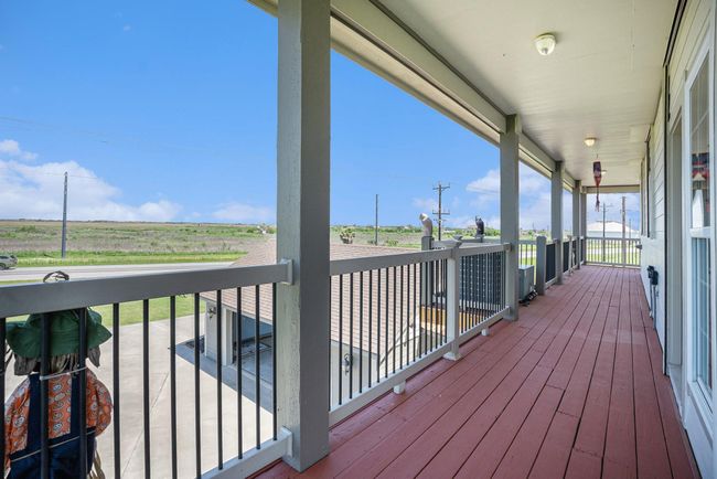 Away from both the beach and the porch, a section of the walk-around deck provides an alternative outdoor space. | Image 34