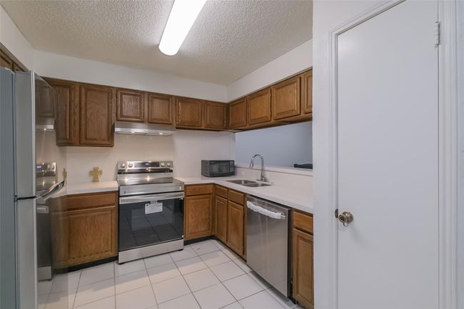 5026 Algernon Dr, House other with 4 bedrooms, 2 bathrooms and 2 parking in Spring TX | Image 5