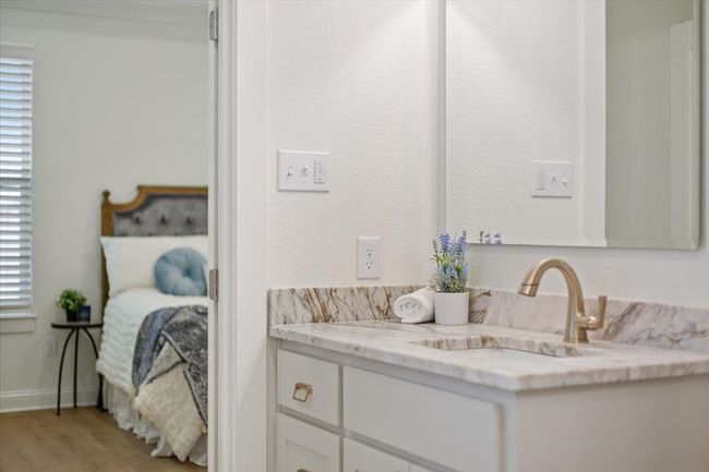 Bathroom with vanity and wood finished floors | Image 17
