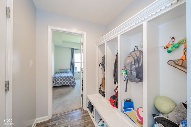 mudroom w/ access to 3 car garage and bedroom 1 | Image 6