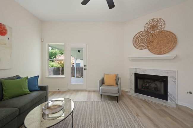 Gas log fireplace in the family room | Image 9