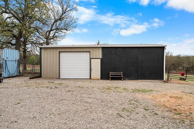View of outbuilding featuring an outbuilding and fence | Image 47