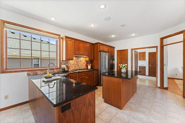 9946 Wellington Ln, Townhouse with 4 bedrooms, 3 bathrooms and null parking in Woodbury MN | Image 22
