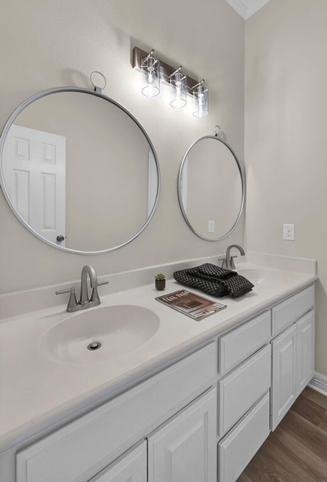 Guest Bath featuring double vanity and updated fixtures, lighting and mirrors | Image 27