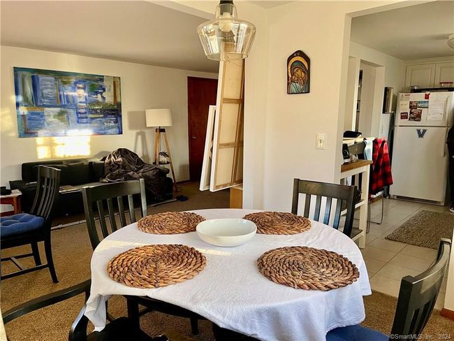 Dining Area looking into Kitchen and Living Area in Apartment | Image 20