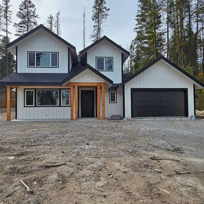 View of front of home featuring a garage | Image 2