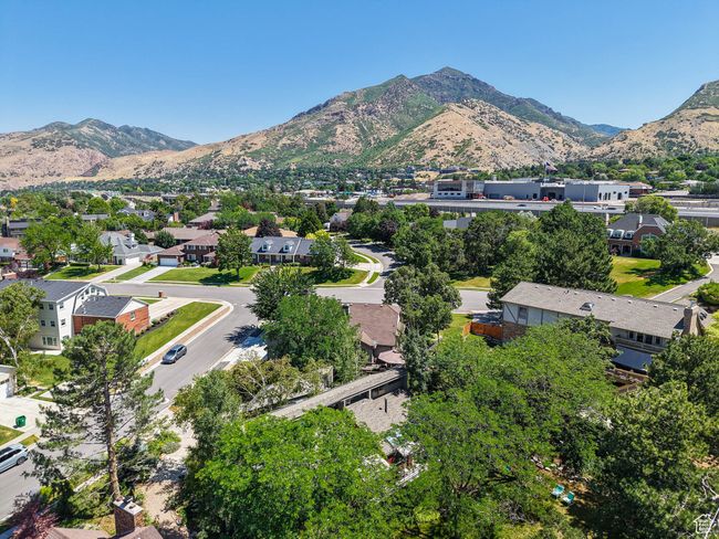 Aerial view of residential area featuring mountains | Image 75