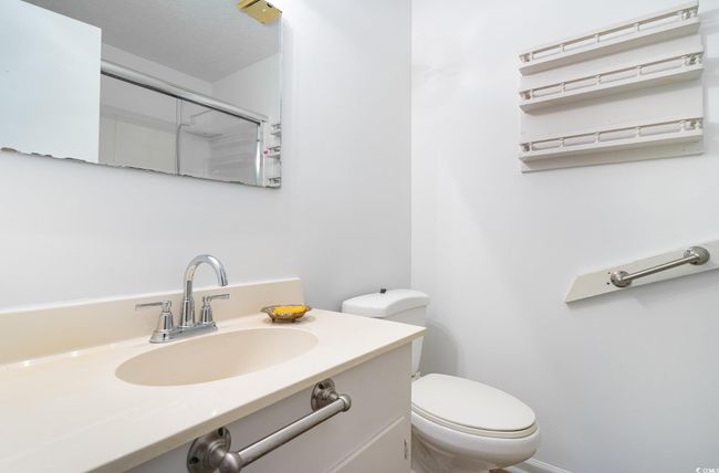 Bathroom with vanity and toilet | Image 11