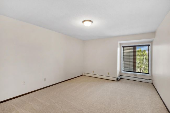 Primary Bedroom with fresh paint and new carpeting | Image 17