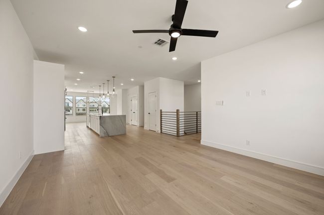 This light filled open concept floor plan is a dream come true! | Image 14