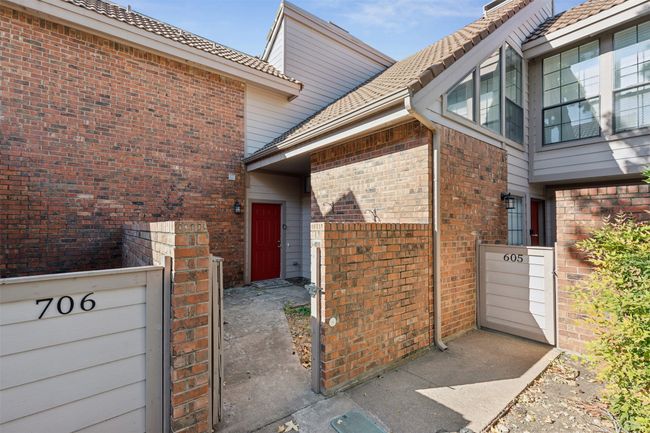 Property entrance with brick siding | Image 26