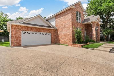 View of front of house with a garage | Image 2