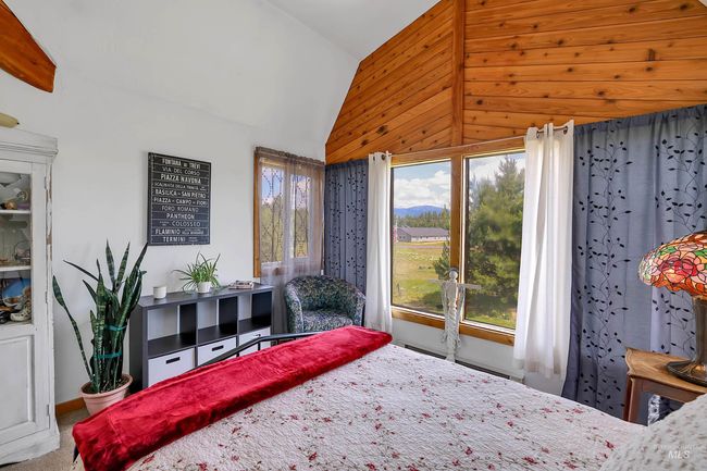 Bedroom with high vaulted ceiling | Image 29