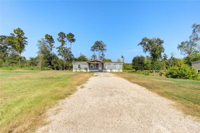 814 Road 5202, House other with 3 bedrooms, 2 bathrooms and null parking in Cleveland TX | Image 1