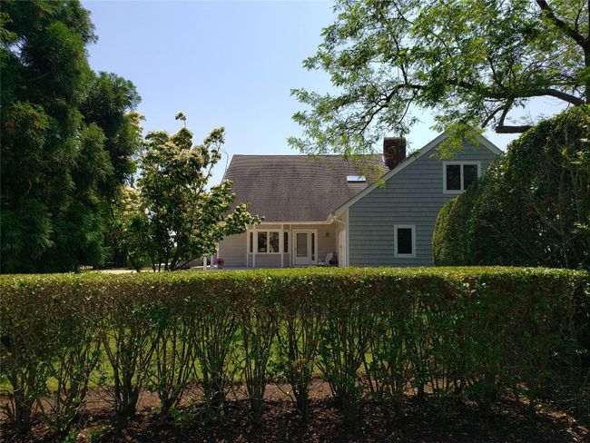 Tucked away on a landscaped acre | Image 6
