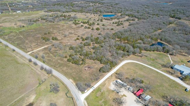Lot 1. Lot2 begins after the dirt drive going towards the large pond in background. | Image 4