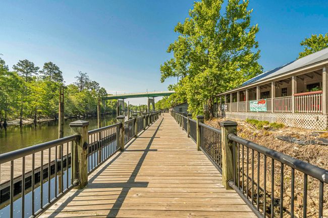 Dock area featuring a water view | Image 25