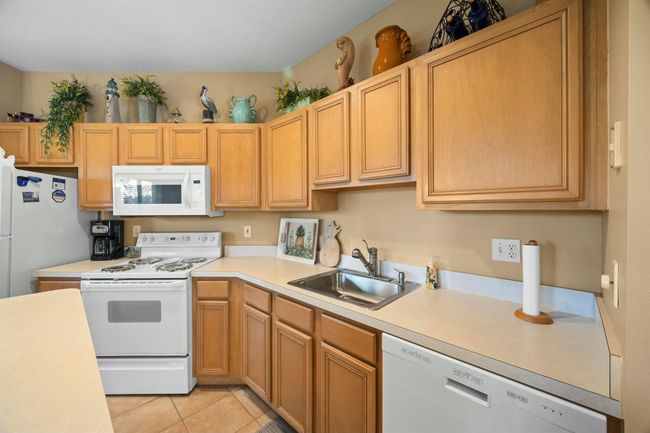 21 - 9894 Perfect Dr, Condo with 2 bedrooms, 2 bathrooms and null parking in Saint Lucie West FL | Image 5