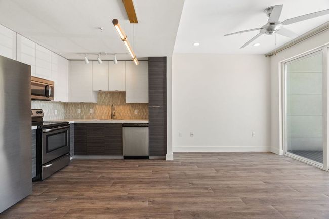 The open design flows seamlessly into the living space, making cooking and entertaining effortless. | Image 9