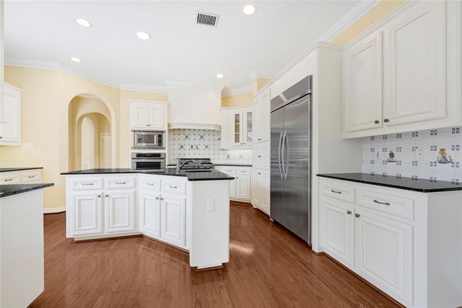 Another view of kitchen island. | Image 18