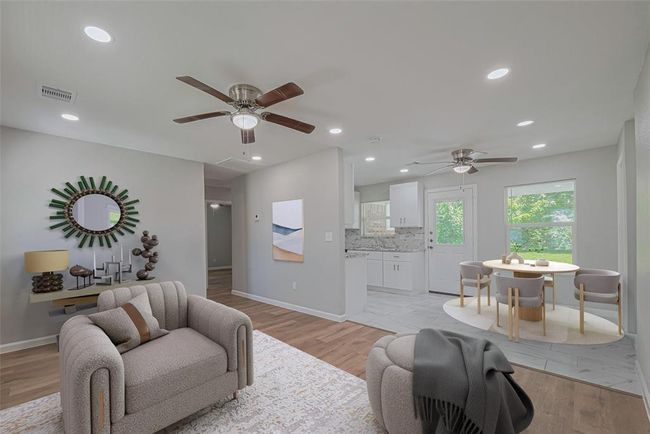 *virtually staged* perfect for entertaining, the breakfast area opens to the living room. | Image 7
