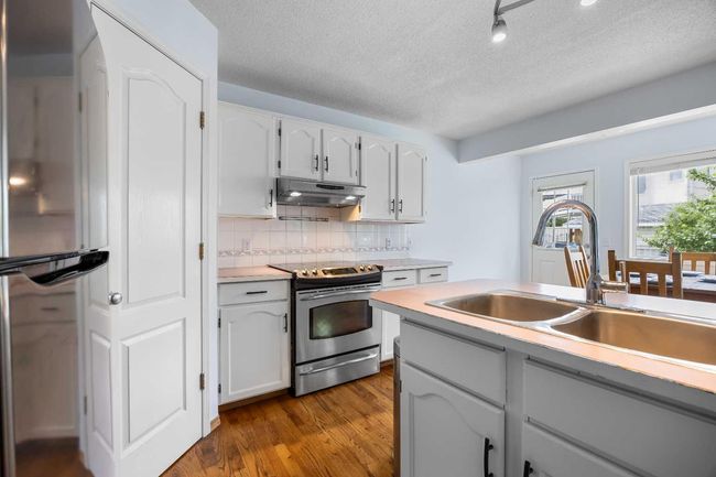 240 Arbour Ridge Way Nw, House other with 6 bedrooms, 4 bathrooms and 4 parking in Calgary AB | Image 10