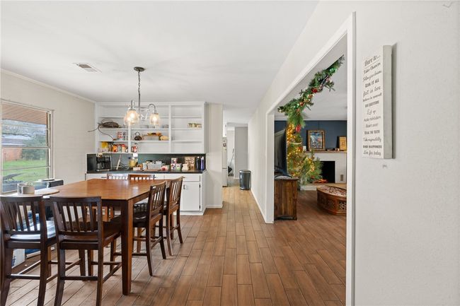 Dining area with hardwood / wood-style floors | Image 6