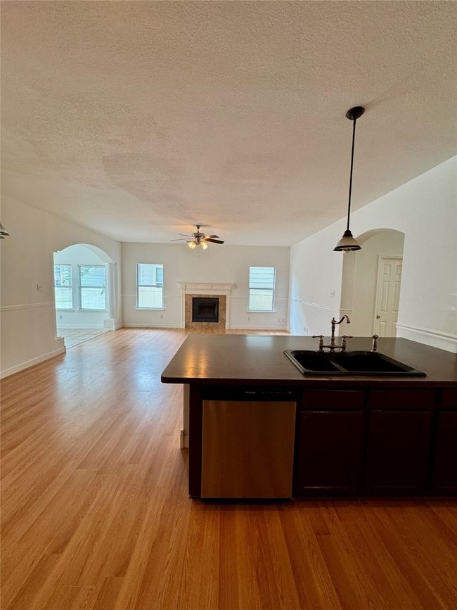 Kitchen featuring dishwasher, a sink | Image 11