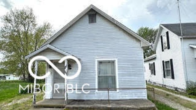 front of home with porch | Image 19