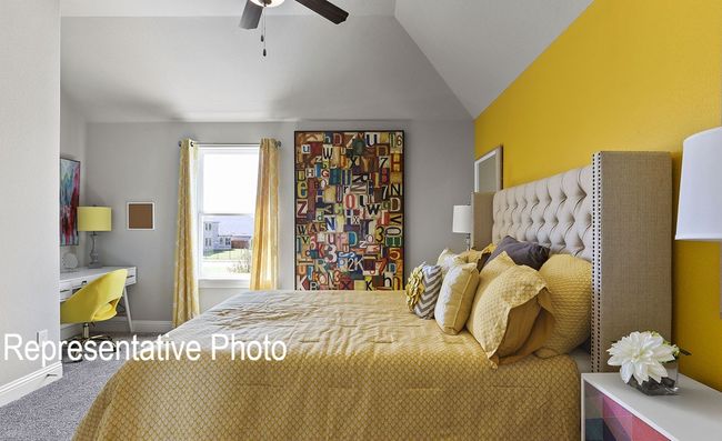 Carpeted bedroom with vaulted ceiling and ceiling fan | Image 11