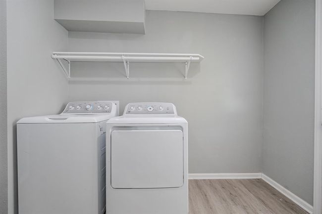 Convenient upper shelving for storing laundry essentials | Image 22