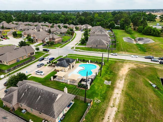 Here’s another view of the inviting community pool—a perfect place to cool off, relax, and enjoy sunny days just minutes from home. | Image 43