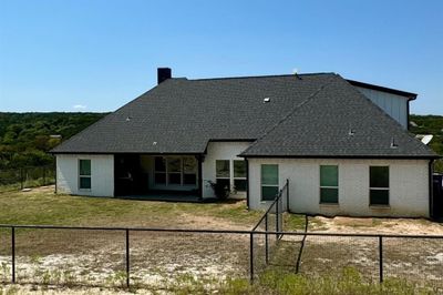 Back of house with a lawn and a patio area | Image 3