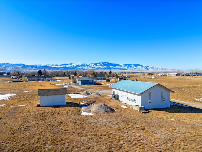 Detached storage shed, offering extra space for tools or gear. | Image 19