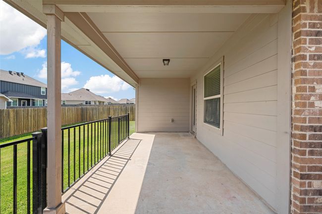 View of patio with a residential view | Image 29