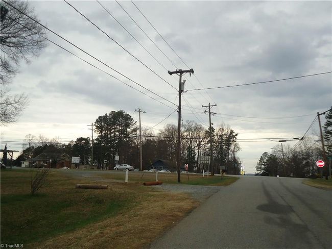 Viewing West along Salisbury St towards its intersection with NC Hwy 109 (Glenn St). | Image 12