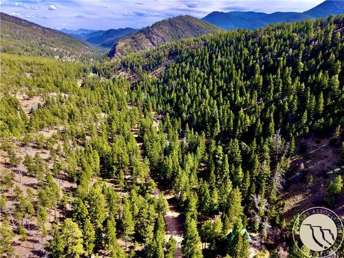 3925 Little Wolf Creek Rd, Wolf Creek, MT, 59648-8530 | Card Image