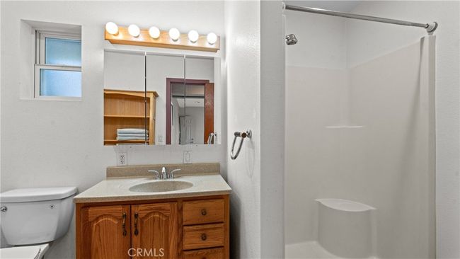 Bathroom on lower level with step-in shower... | Image 50