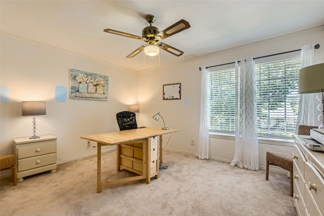 Office space with ceiling fan, light colored carpet, and baseboards | Image 18