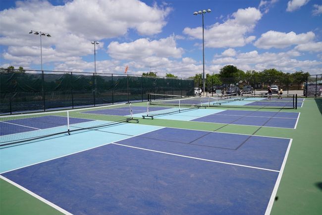 View of tennis court featuring community basketball court | Image 39